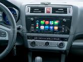 Car dashboard with touchscreen display and various controls
