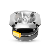 Metallic mechanical component with a yellow label on a white background