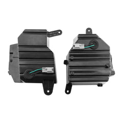 Two black electrical components on a white background
