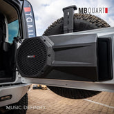MB Quart speaker system attached to a vehicle with 'Music. Defined.' text
