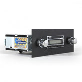 Car radio with cassette player on a white background