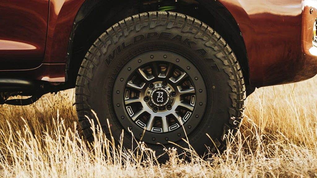 Close-up of picture of car with custom wheels
