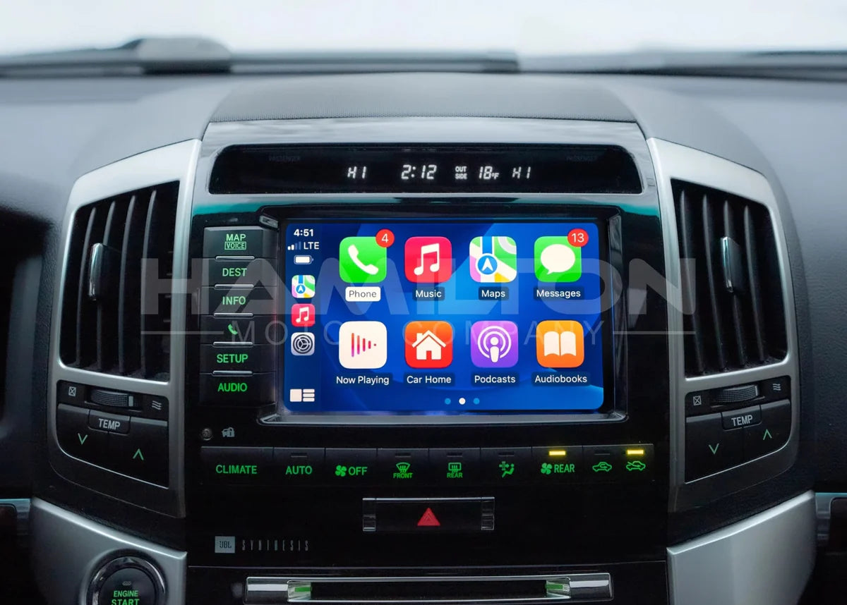 Car dashboard with a touchscreen display showing app icons