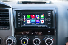 Picture of interior of a Toyota Sequoia with an Apple CarPlay unit
