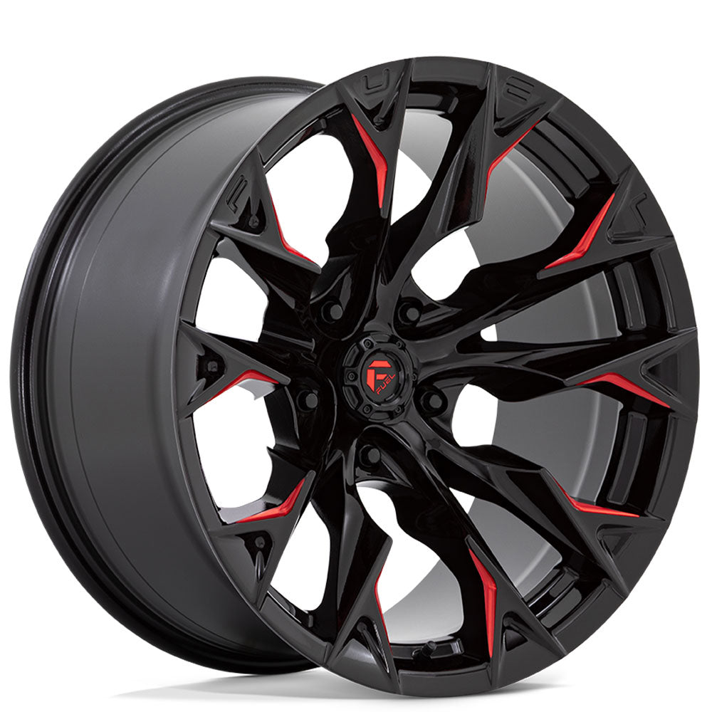 Black alloy wheel with red milled accents on a white background