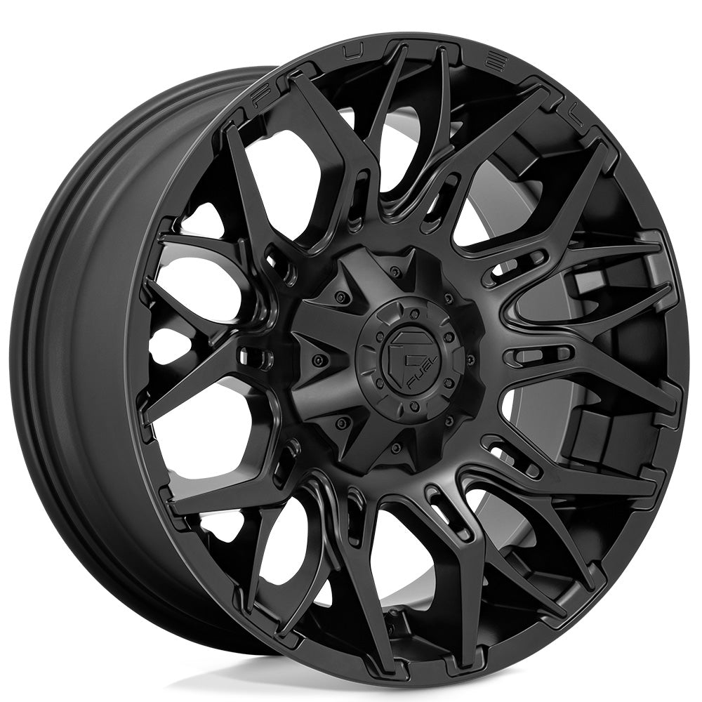 Black alloy wheel on a white background