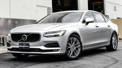 Silver Volvo car parked on a street with Lexani wheels