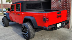 Custom Wheels: 22” TIS 554BM Gloss Black Milled Rims