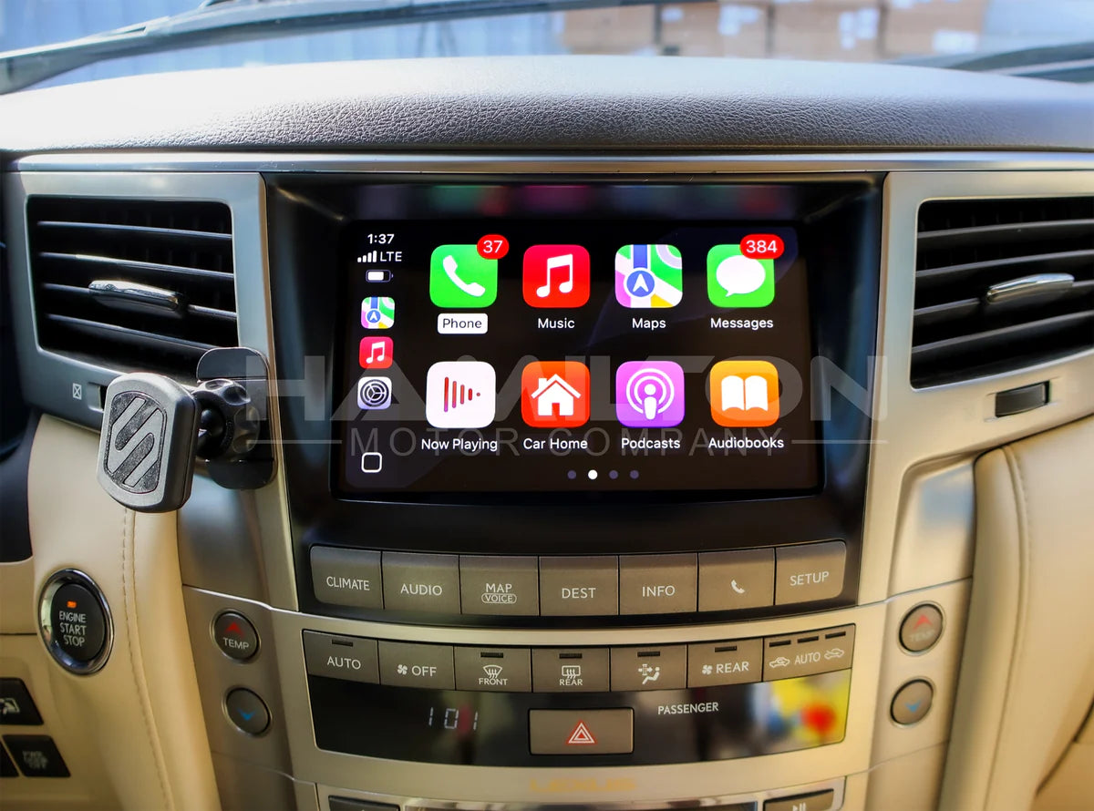 Car dashboard with a touchscreen display showing app icons