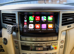 Car dashboard with a touchscreen display showing app icons