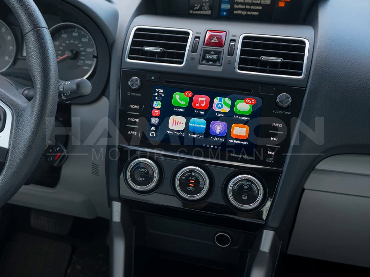 Car dashboard with touchscreen display and control buttons