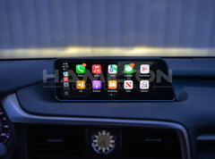 Car dashboard with a digital display showing app icons.