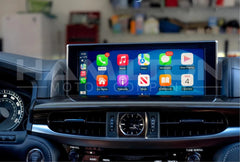 Car dashboard with a touchscreen display showing app icons