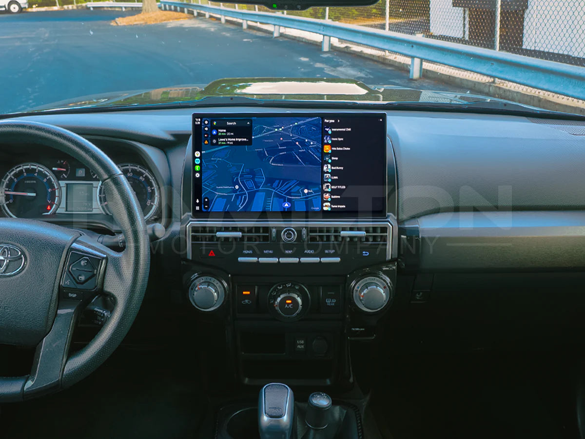 Car interior with a focus on the dashboard and navigation screen.