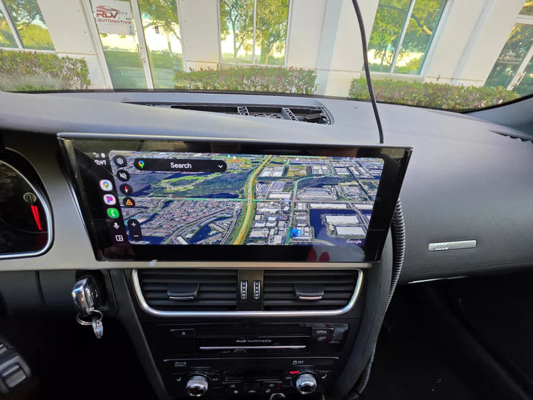 Car dashboard with a navigation screen displaying a map.