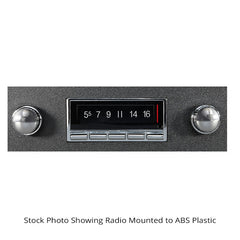 Vintage-style radio with control knobs on a white background