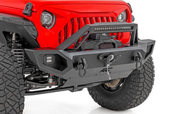Red Jeep with a black front bumper on a white background