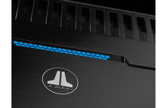 Black audio equipment with JL Audio logo and blue LED lights on a white background