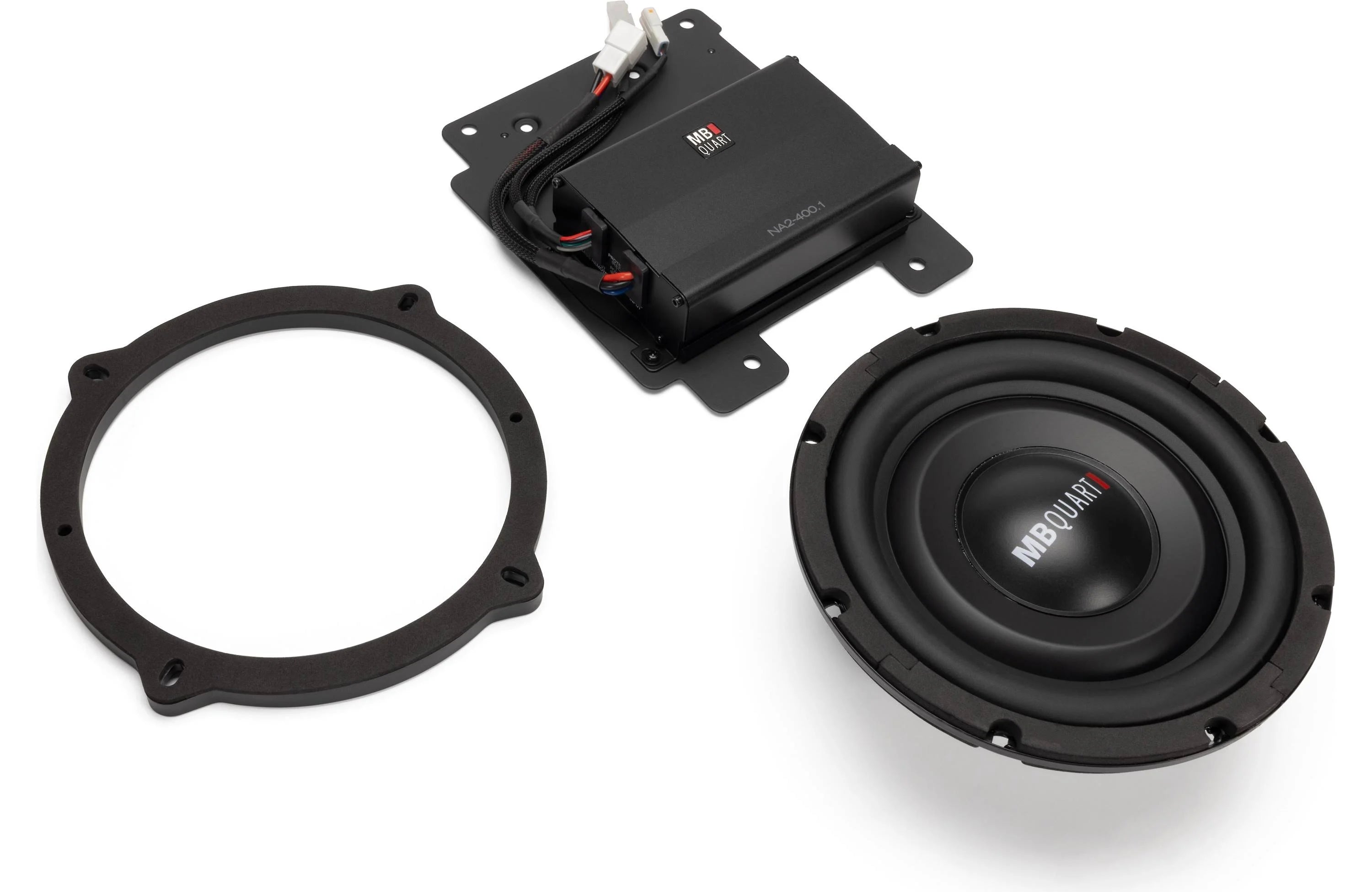 Car audio components, including a subwoofer and amplifier, on a white background