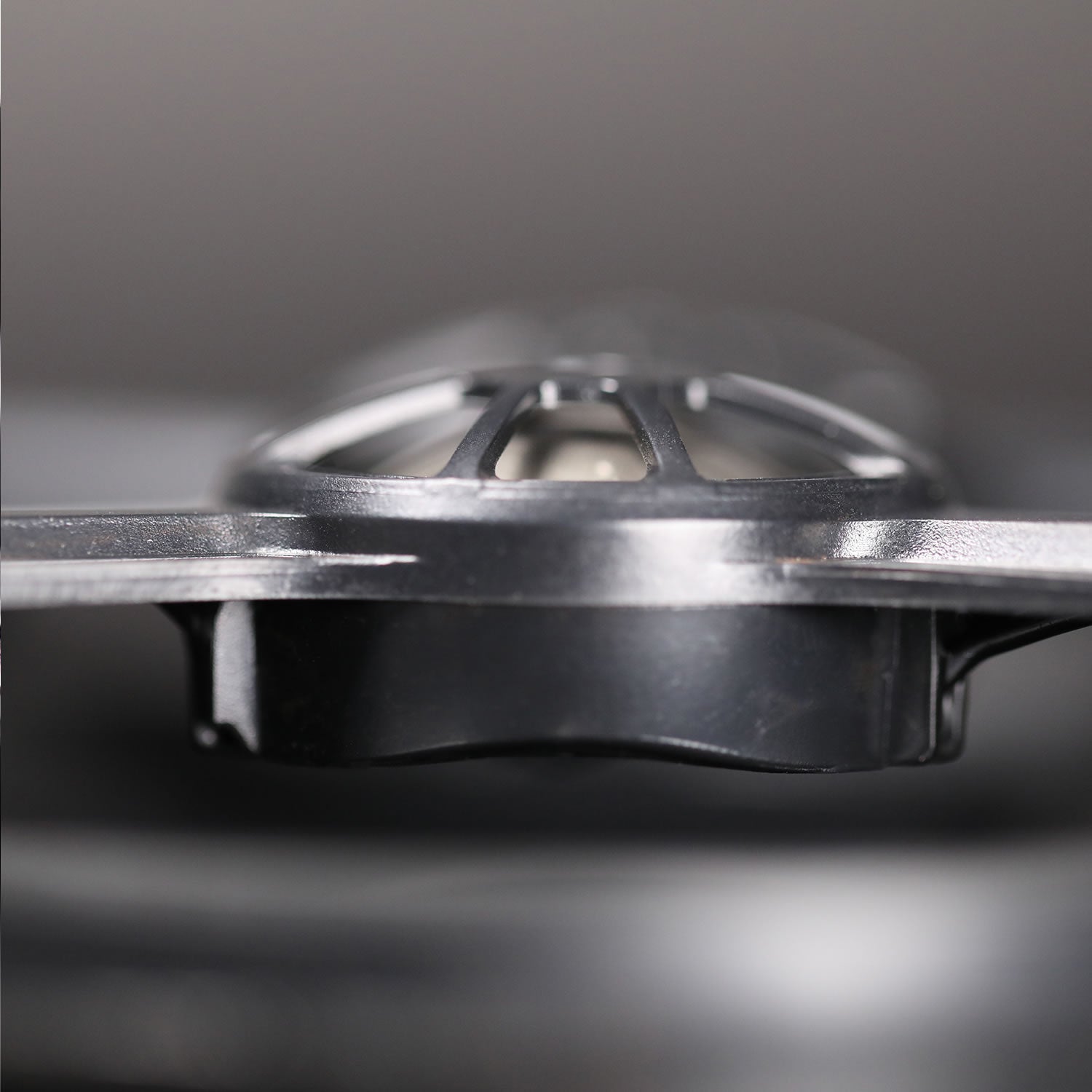 Close-up of a metallic object with a blurred background