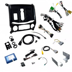 Collection of car audio and wiring components on a white background