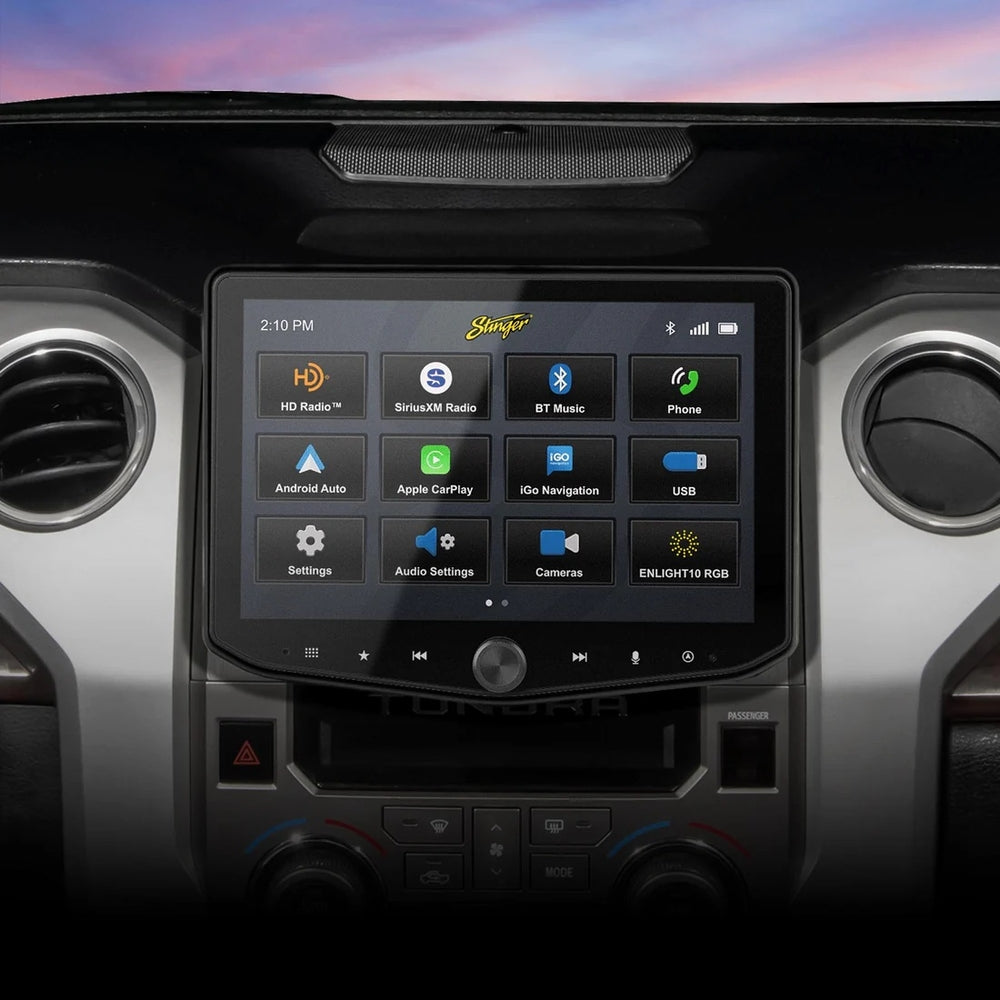 Car dashboard with a touchscreen display showing various icons.