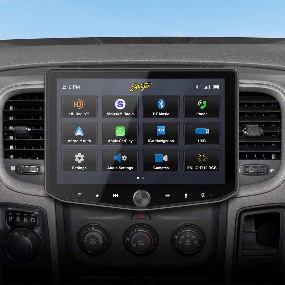 Car dashboard with a touchscreen display showing various functions.
