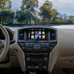Car interior with a focus on the dashboard and infotainment system, showing a clear view of the road ahead.