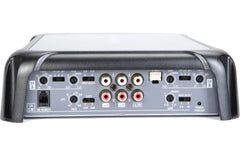 Back panel of an audio amplifier with various connectors on a white background