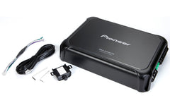 Pioneer car audio amplifier with wiring harness on a white background