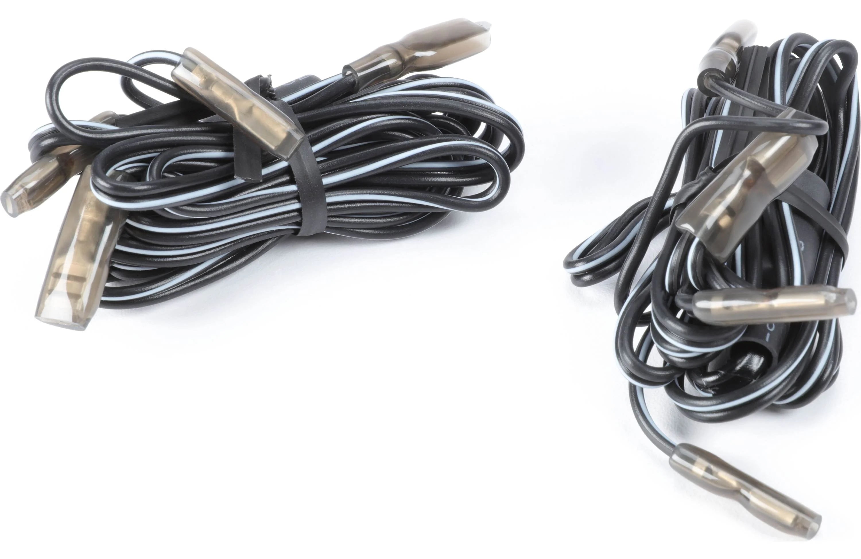 Two sets of black cables with metallic ends on a white background