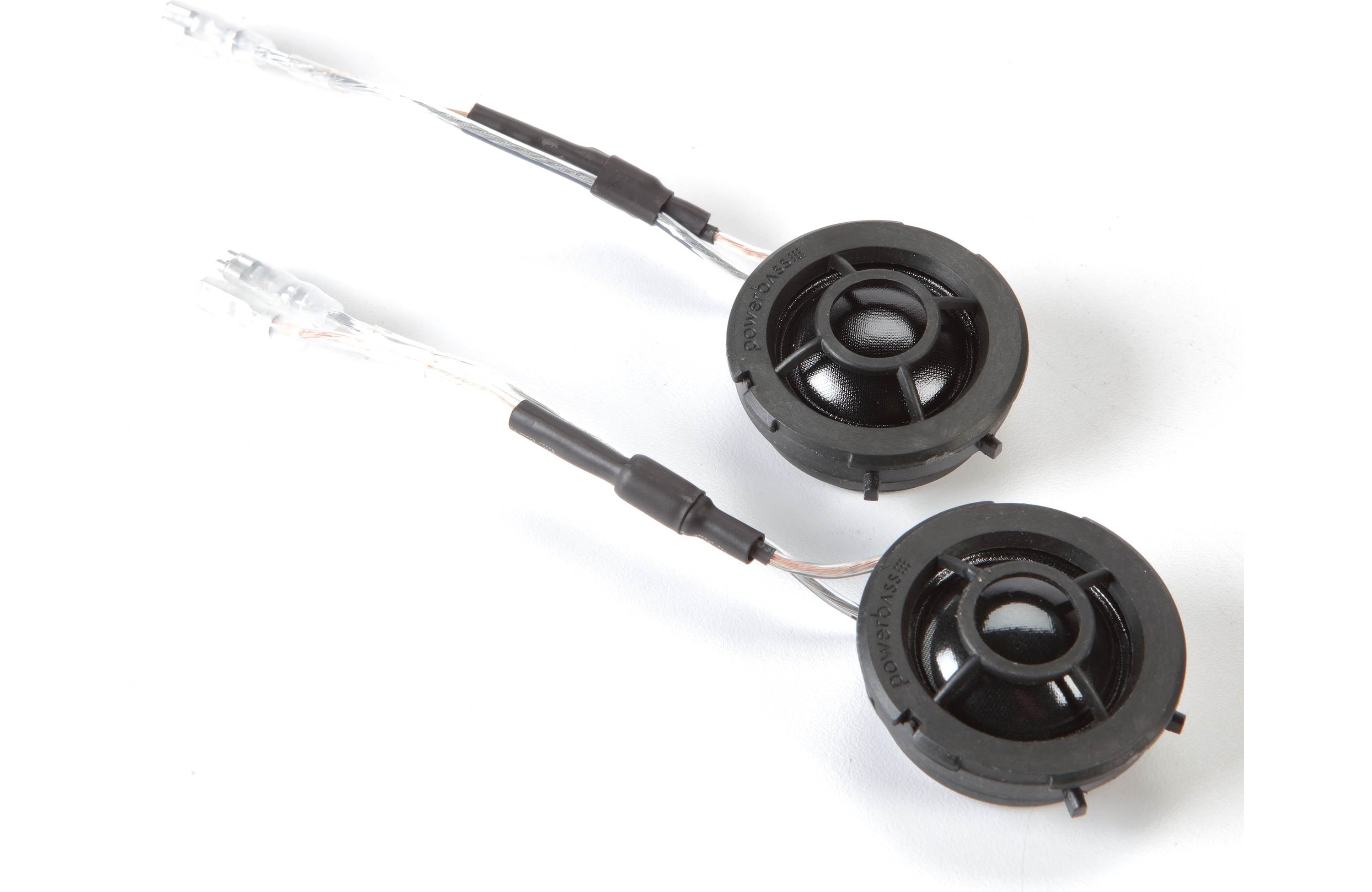 Two black speakers with wires on a white background