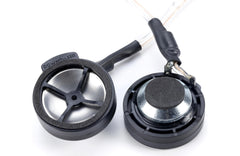 Close-up of a pair of Powerbeats Car Speakers on a white background