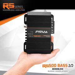 PRV RS500 Bass monoblock amplifier held in a hand with brand logo and product details.