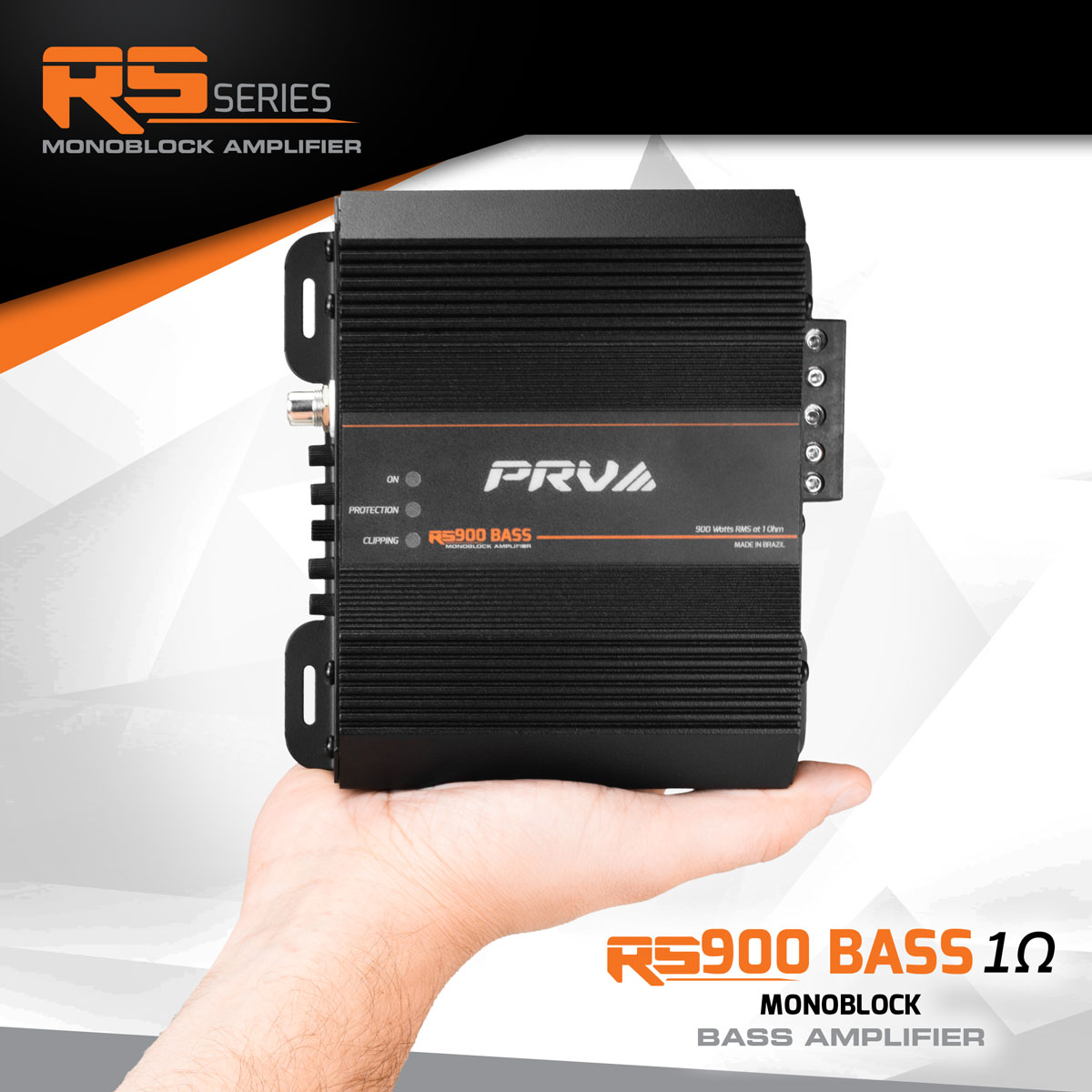 PRV RS900 Bass 1Ω monoblock amplifier held in a hand with brand logo in the background