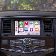 Car dashboard with a touchscreen display showing app icons
