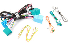 Collection of car wiring harnesses with various connectors on a white background