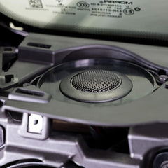 Close-up of a mechanical component with a brand label in the background
