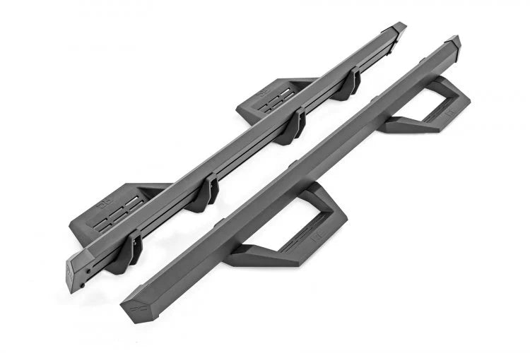 Two gray metal roof racks on a white background