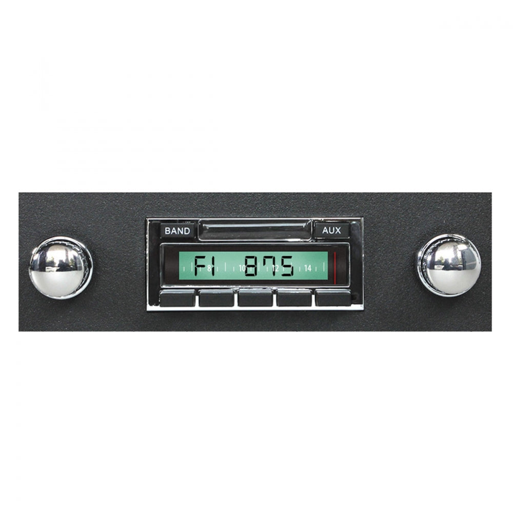 Car radio stereo with digital display and chrome knobs on a white background