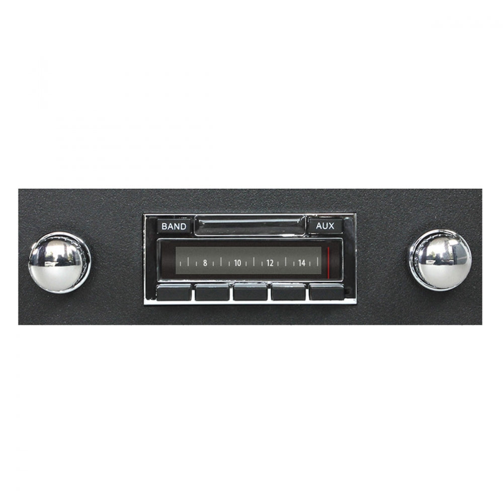Vintage-style car radio with chrome knobs on a white background