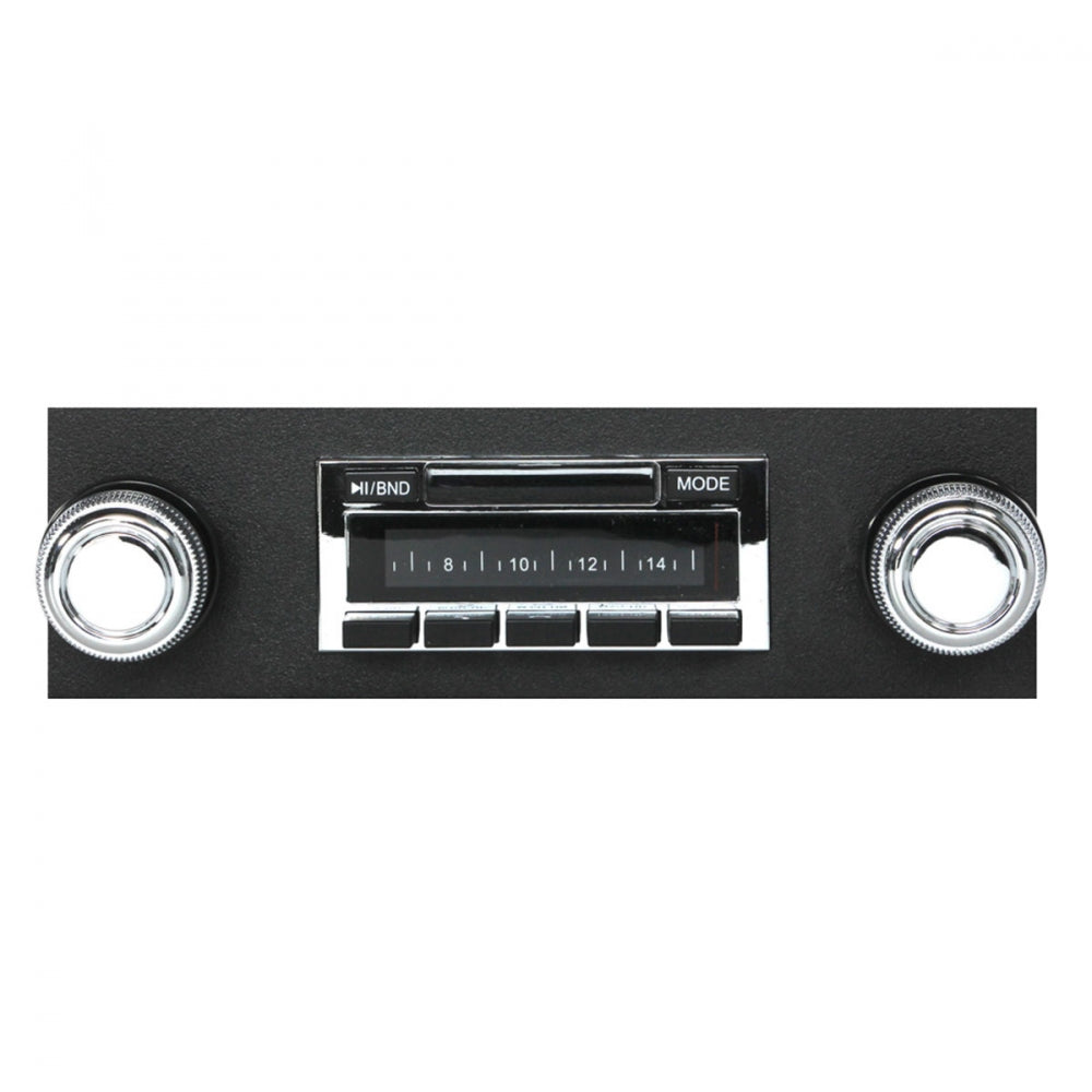 Vintage-style car radio with chrome knobs on a white background